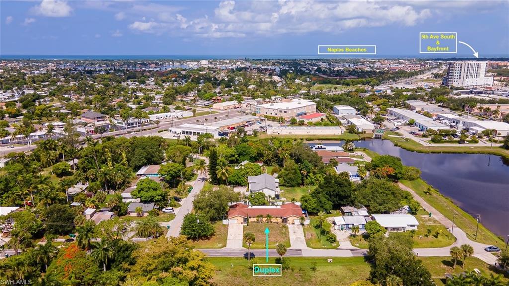 2080 Pelton Avenue Naples, FL 34112 - Photo 19 of 43 a view of a city with lots of residential buildings ocean and mountain view in back