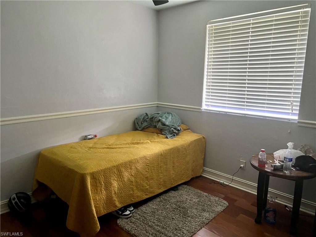 2080 Pelton Avenue Naples, FL 34112 - Photo 37 of 43 a bedroom with a bed and a window