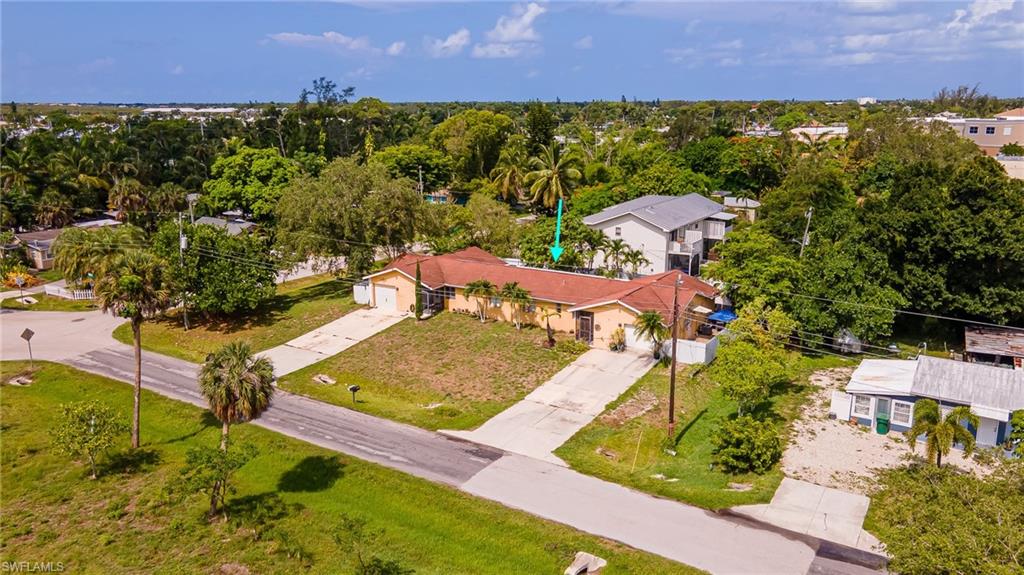 2080 Pelton Avenue Naples, FL 34112 - Photo 7 of 43 an aerial view of a house with a garden