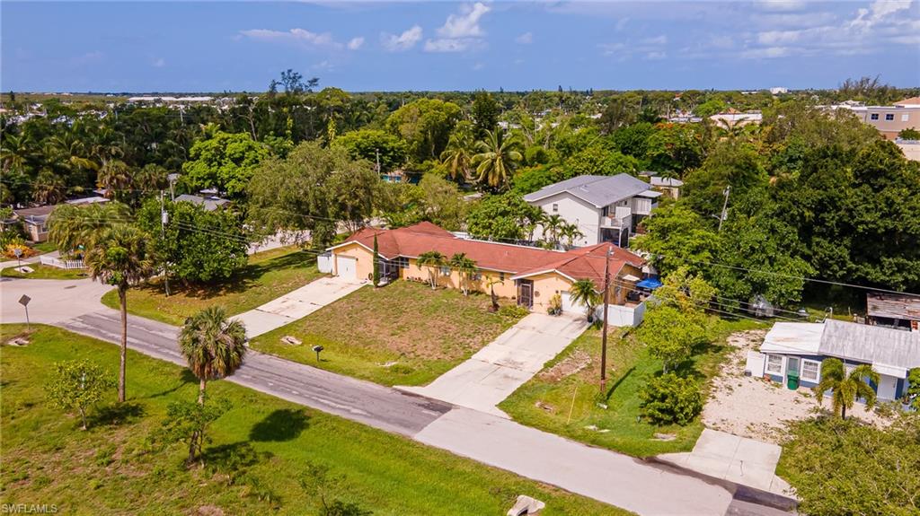 2080 Pelton Avenue Naples, FL 34112 - Photo 8 of 43 an aerial view of a house with a garden