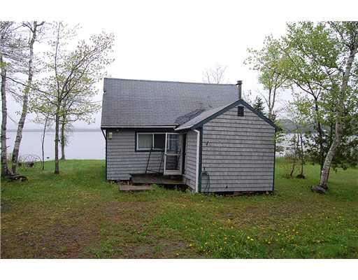 61 Ledge Point Hudson, ME 04449 - Photo 1 of 5 Exterior Front.