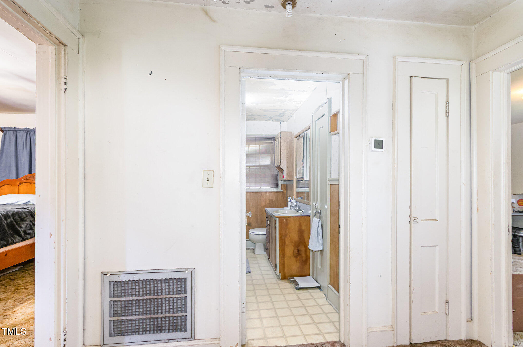 2089 Virgilina Road Roxboro, NC 27573 - Photo 23 of 32 a bathroom with a sink and a mirror