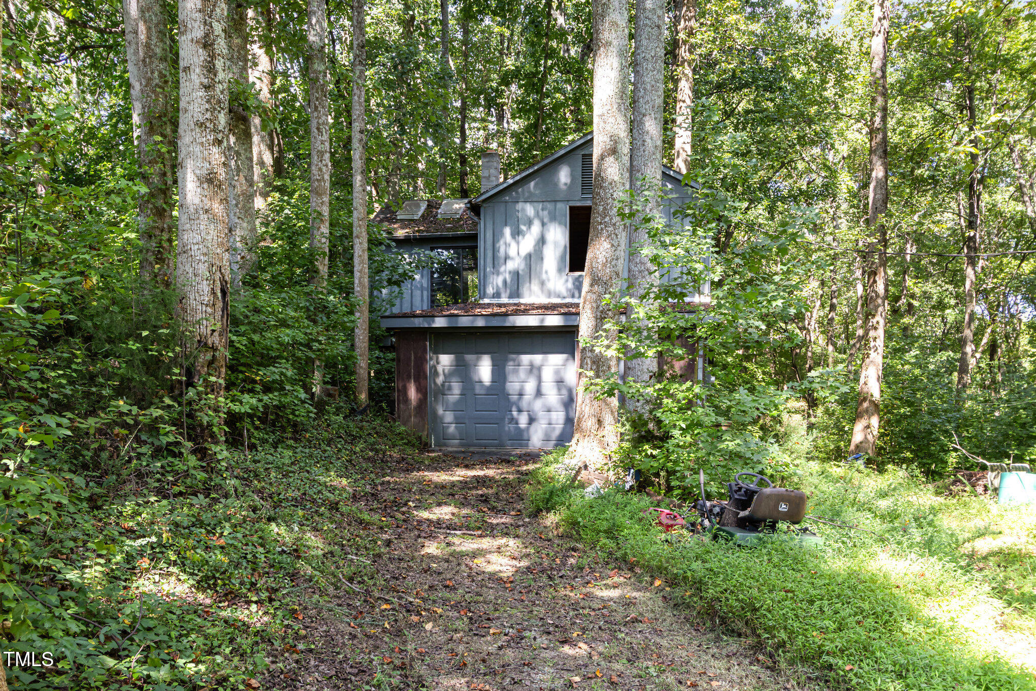 2089 Virgilina Road Roxboro, NC 27573 - Photo 28 of 32 a view of a house with a yard and sitting area