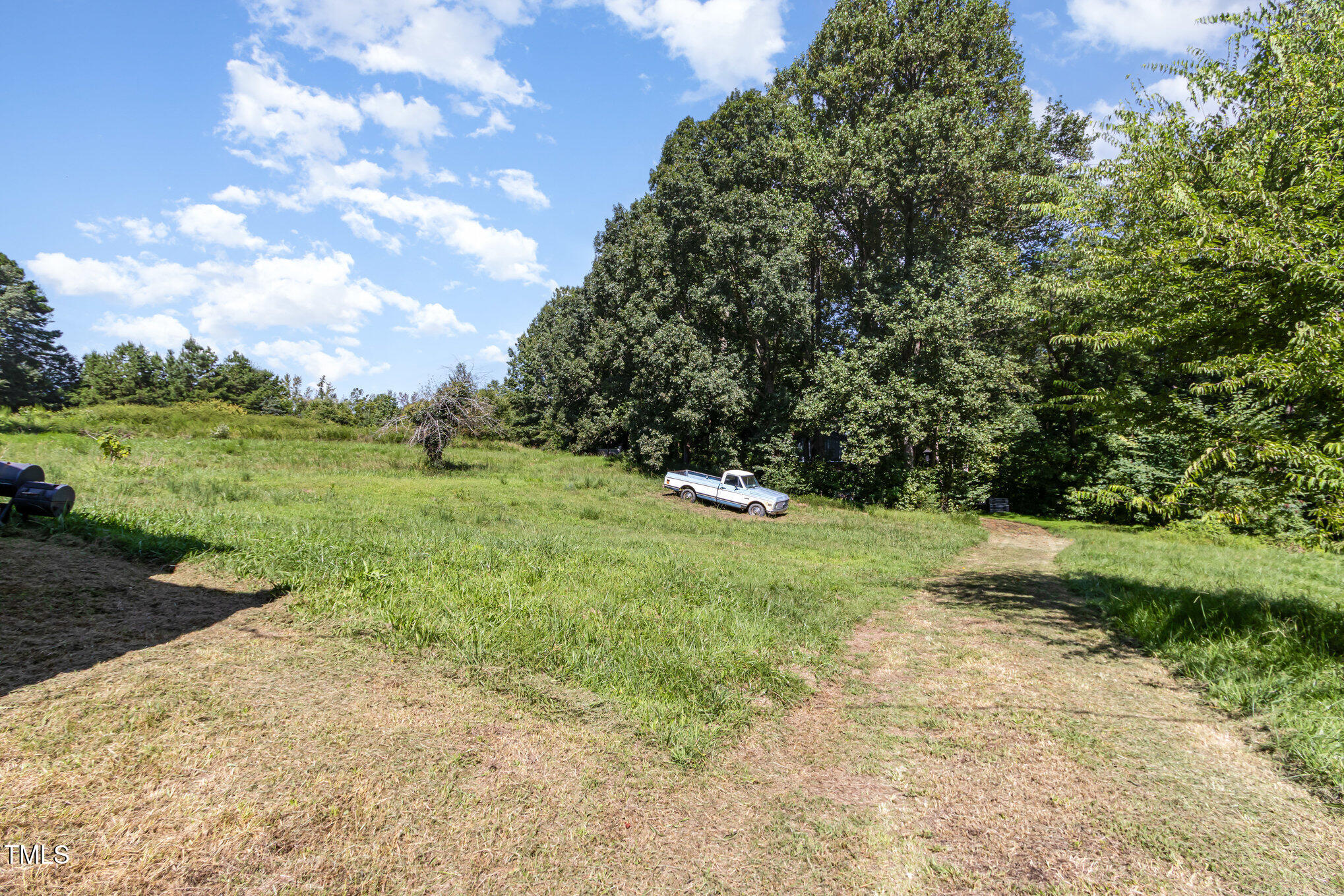 2089 Virgilina Road Roxboro, NC 27573 - Photo 31 of 32 a view of a field with an trees