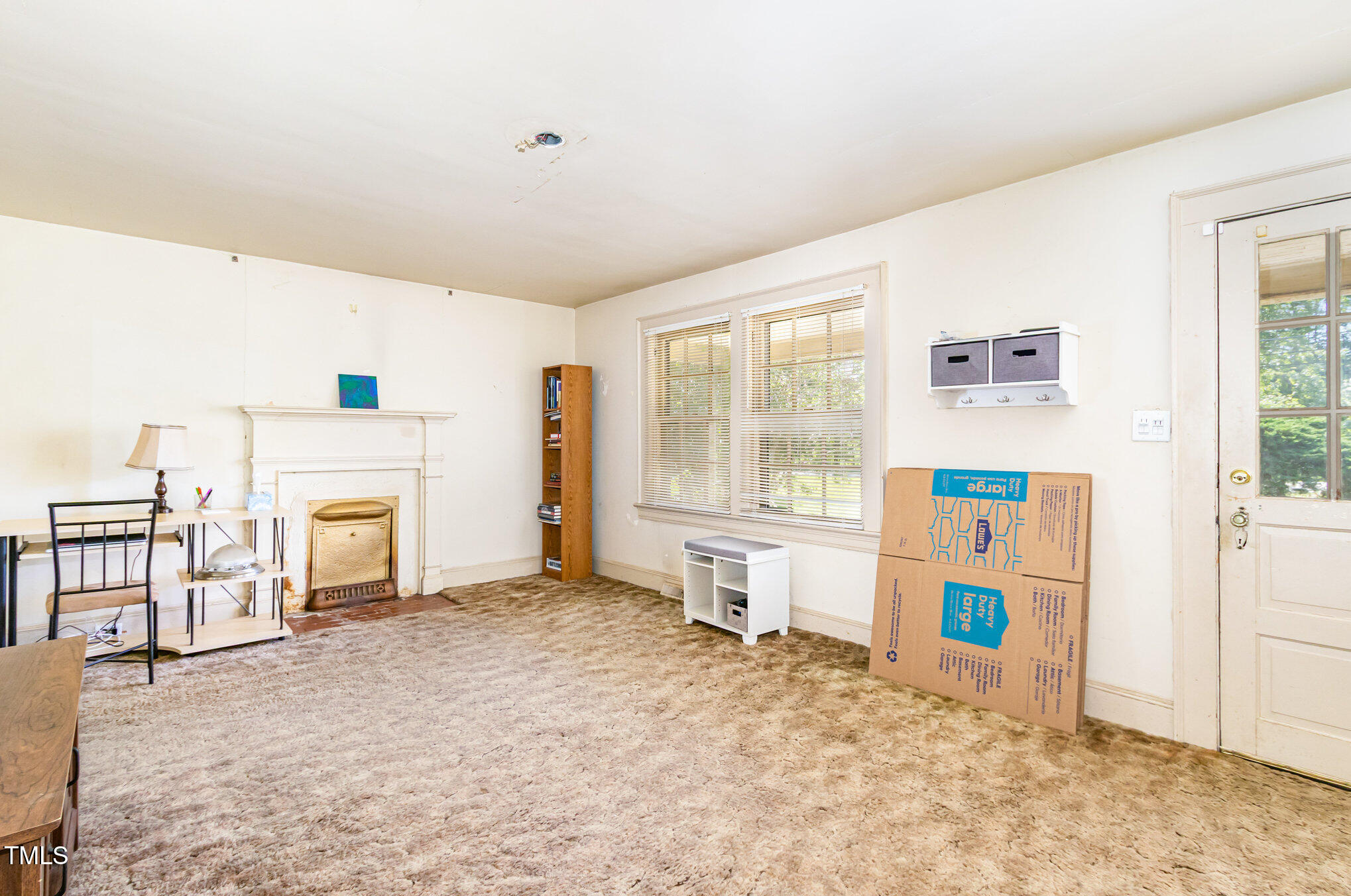 2089 Virgilina Road Roxboro, NC 27573 - Photo 5 of 32 a view of kitchen with furniture and fireplace