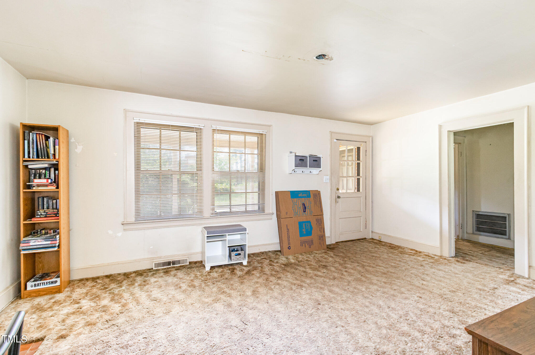 2089 Virgilina Road Roxboro, NC 27573 - Photo 7 of 32 an empty room with windows