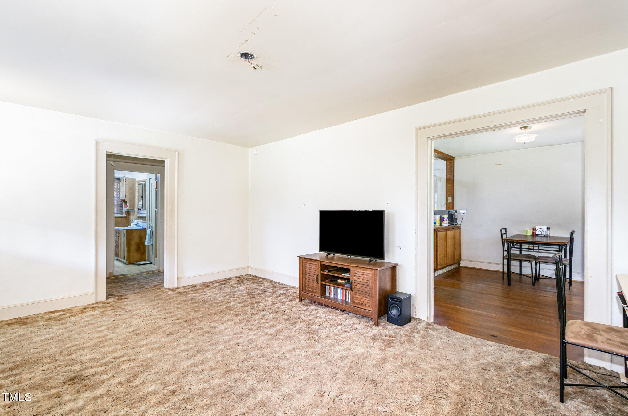 2089 Virgilina Road Roxboro, NC 27573 - Photo 8 of 32 a view of livingroom with furniture and flat screen tv