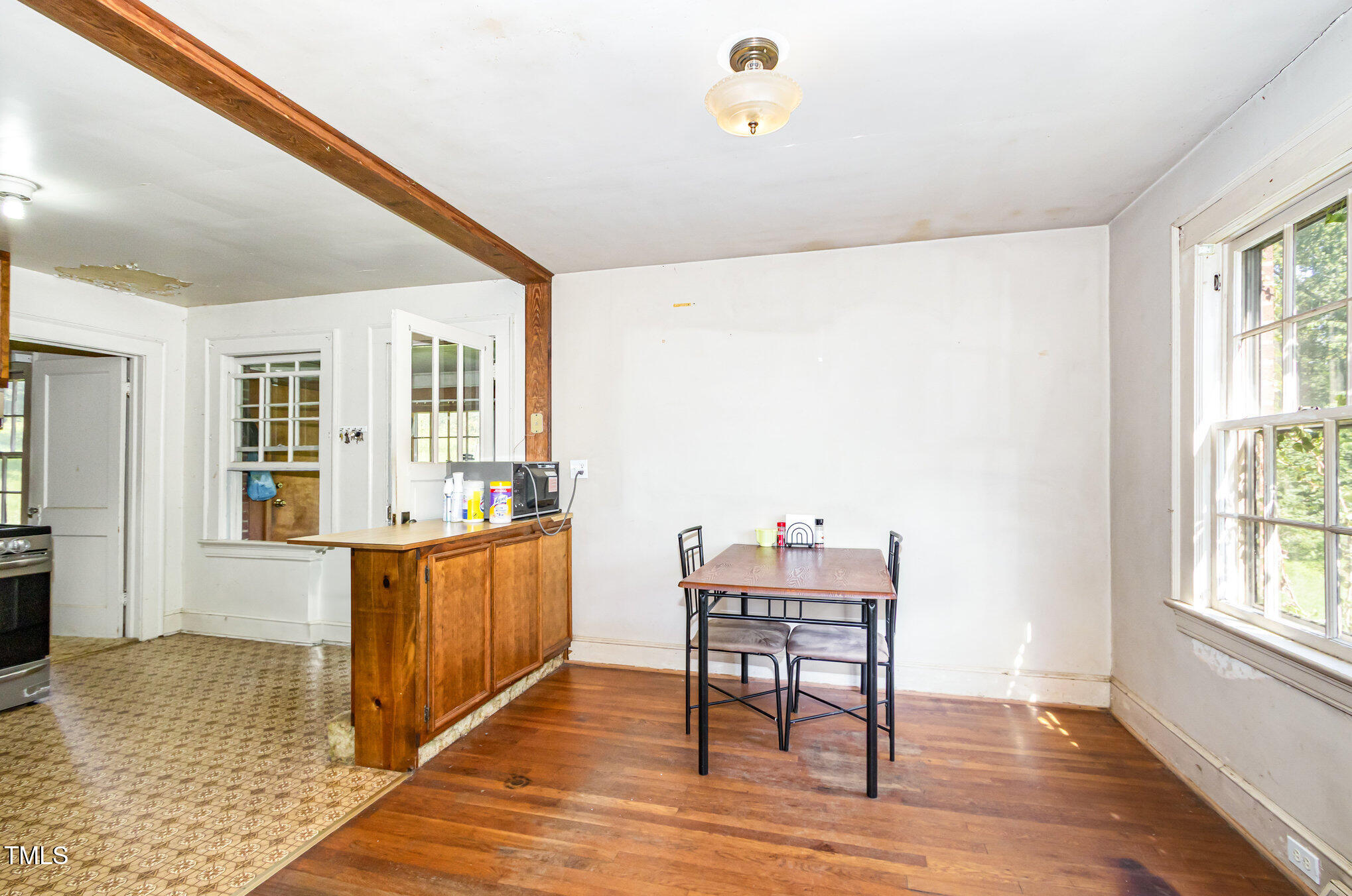 2089 Virgilina Road Roxboro, NC 27573 - Photo 9 of 32 a room with furniture and window