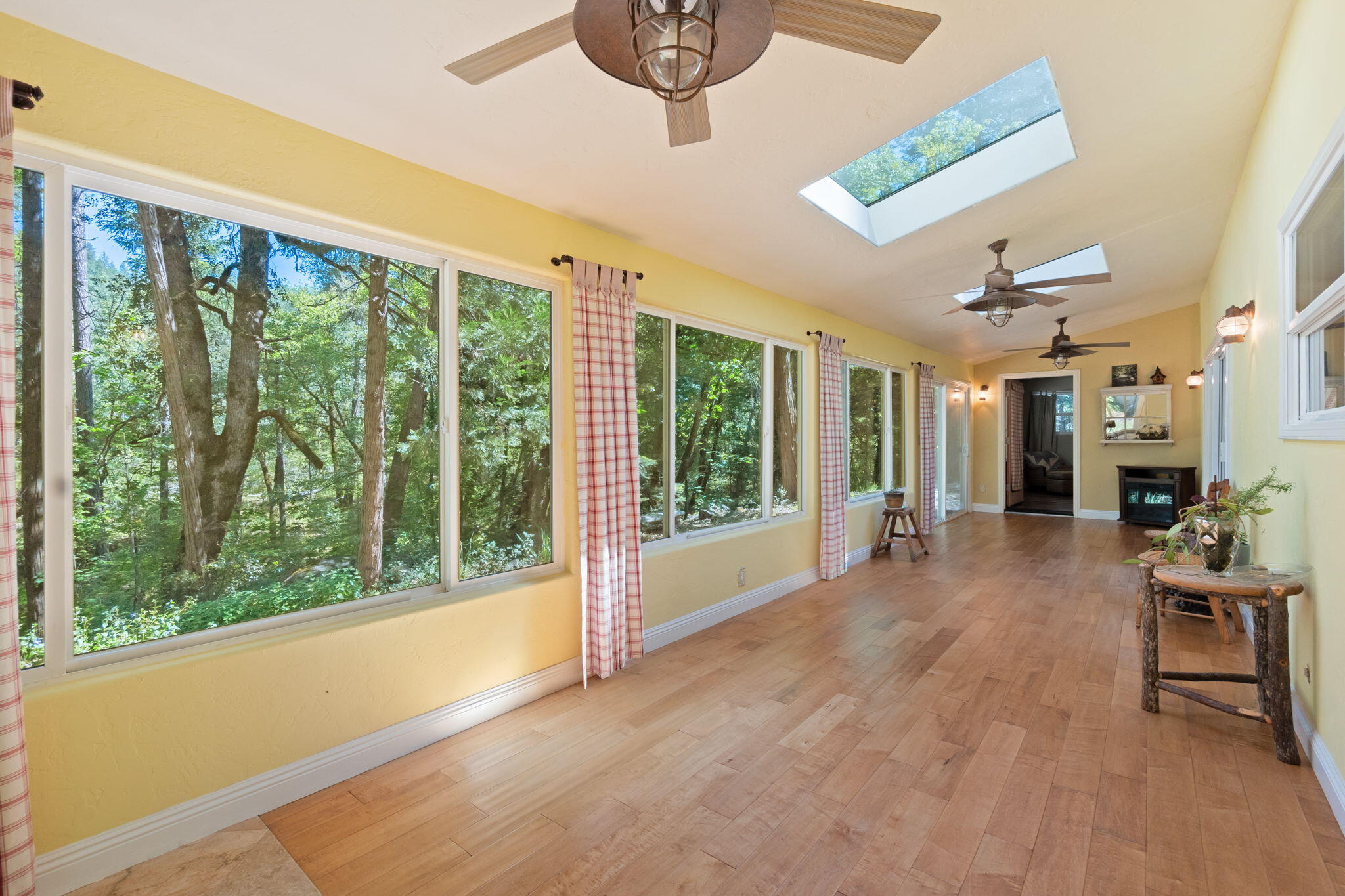 30303 Oak Run To Fern Road Whitmore, CA 96096 - Photo 20 of 75 a view of livingroom with furniture wooden floor and windows