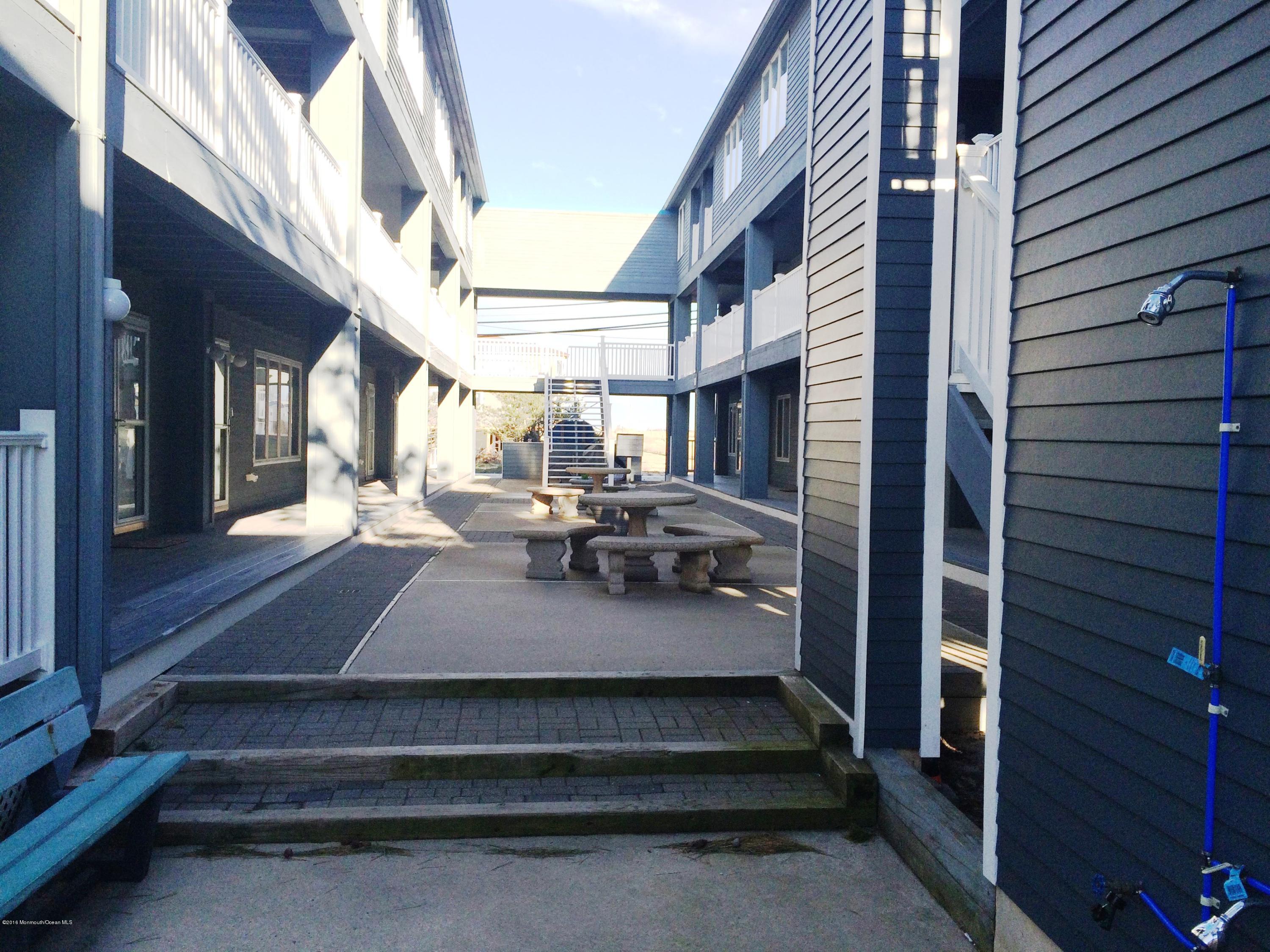 1709 Highway 35, Unit 2 Seaside Heights, NJ 08751 - Photo 6 of 12 Courtyard & Outside shower