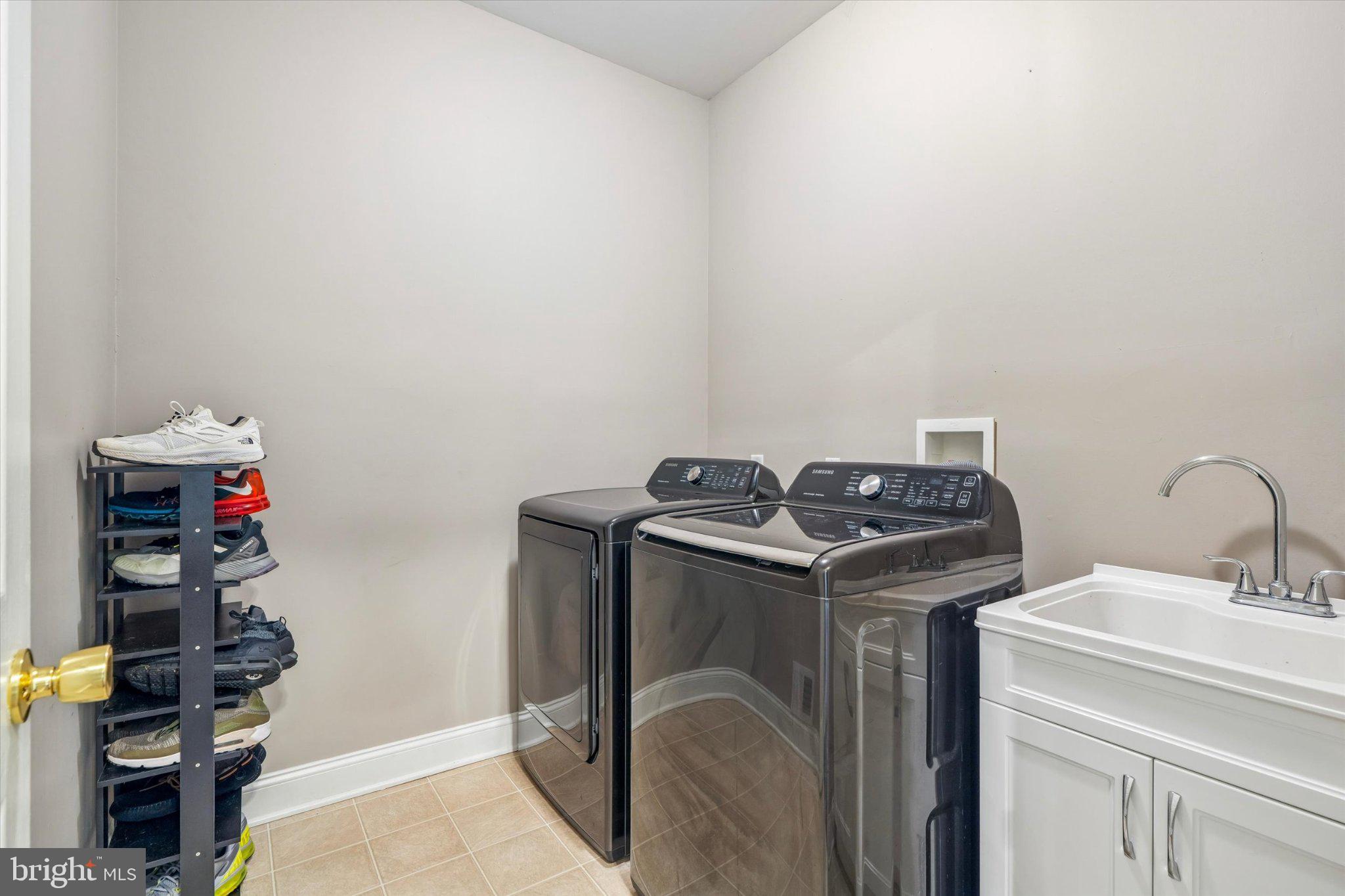 70 Alexandrea Circle Harleysville, PA 19438 - Photo 19 of 46 Sleek laundry room with modern appliances.