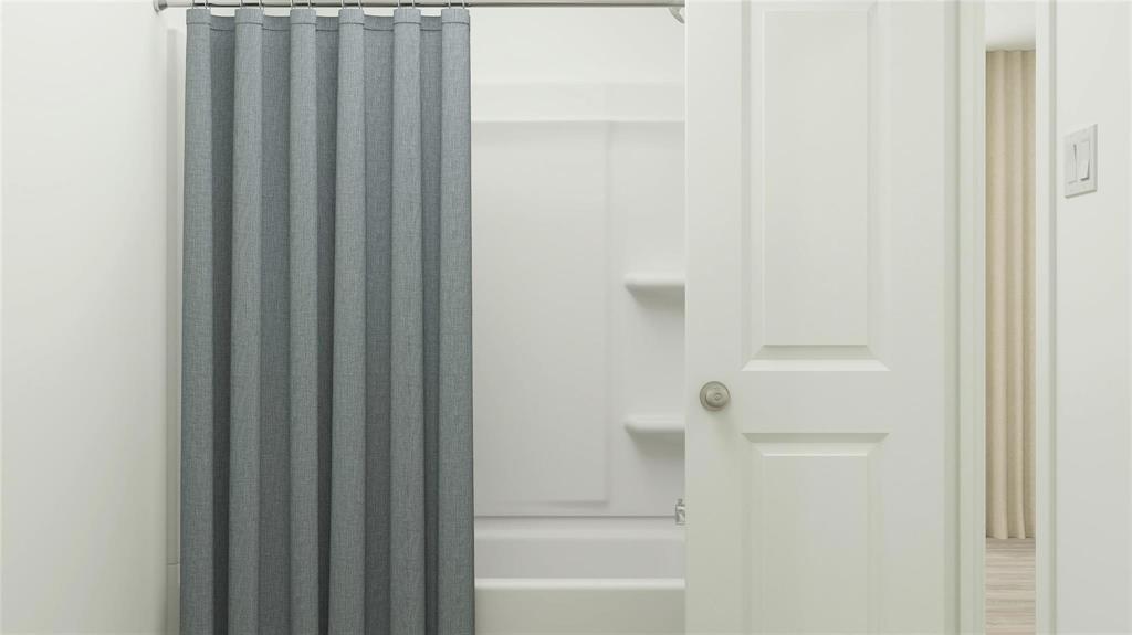 2009 Welsh Lane Aubrey, TX 76227 - Photo 18 of 24 a bathroom with bathtub and shower