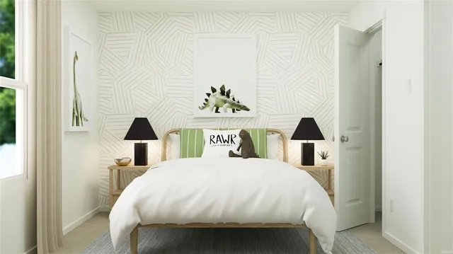 a bed room with a bed and a lamp on table