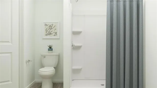 a bathroom with a toilet