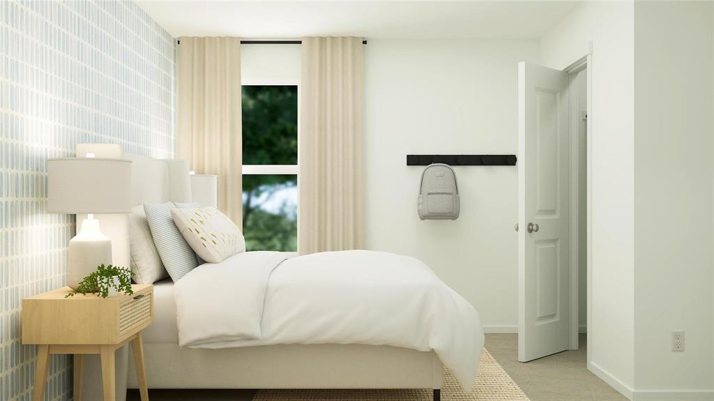 2009 Welsh Lane Aubrey, TX 76227 - Photo 21 of 24 a bedroom with a bed and a painting on the wall