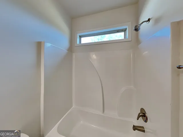 a bathroom with a window