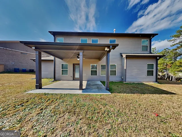 a view of a house with a patio