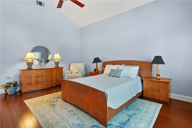 a bedroom with bed and a dresser