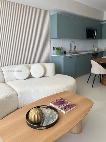 a living room with furniture and a couch