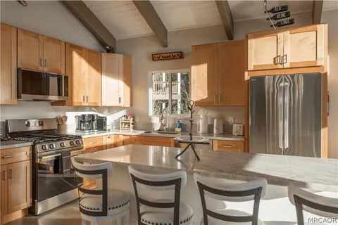 a dining table chair and fireplace