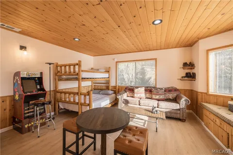 a view of a patio with table and chairs