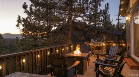 a view of a balcony with chairs