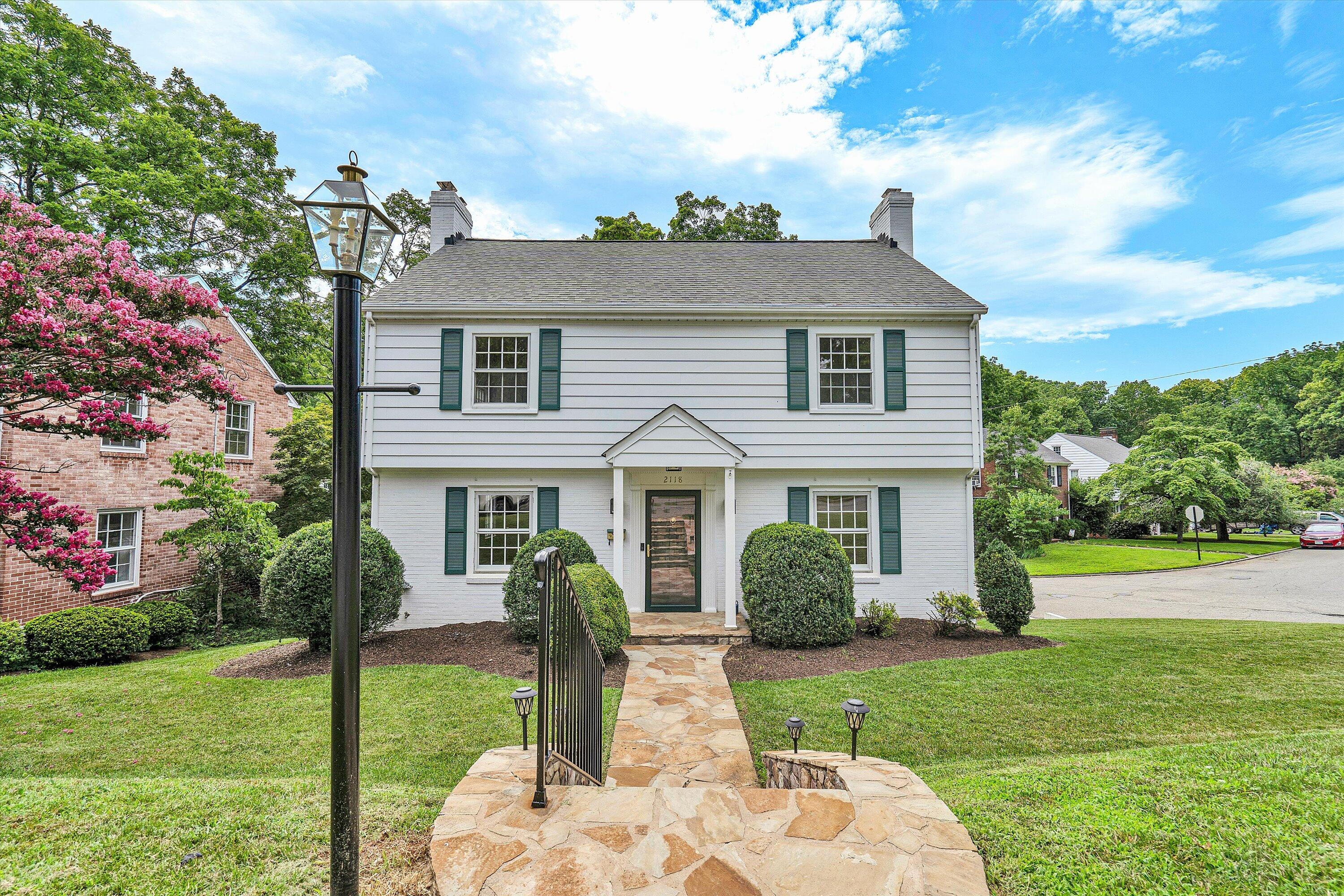 2118 Mt Vernon Road Southwest Roanoke, VA 24015 - Photo 1 of 53 a front view of a house with garden