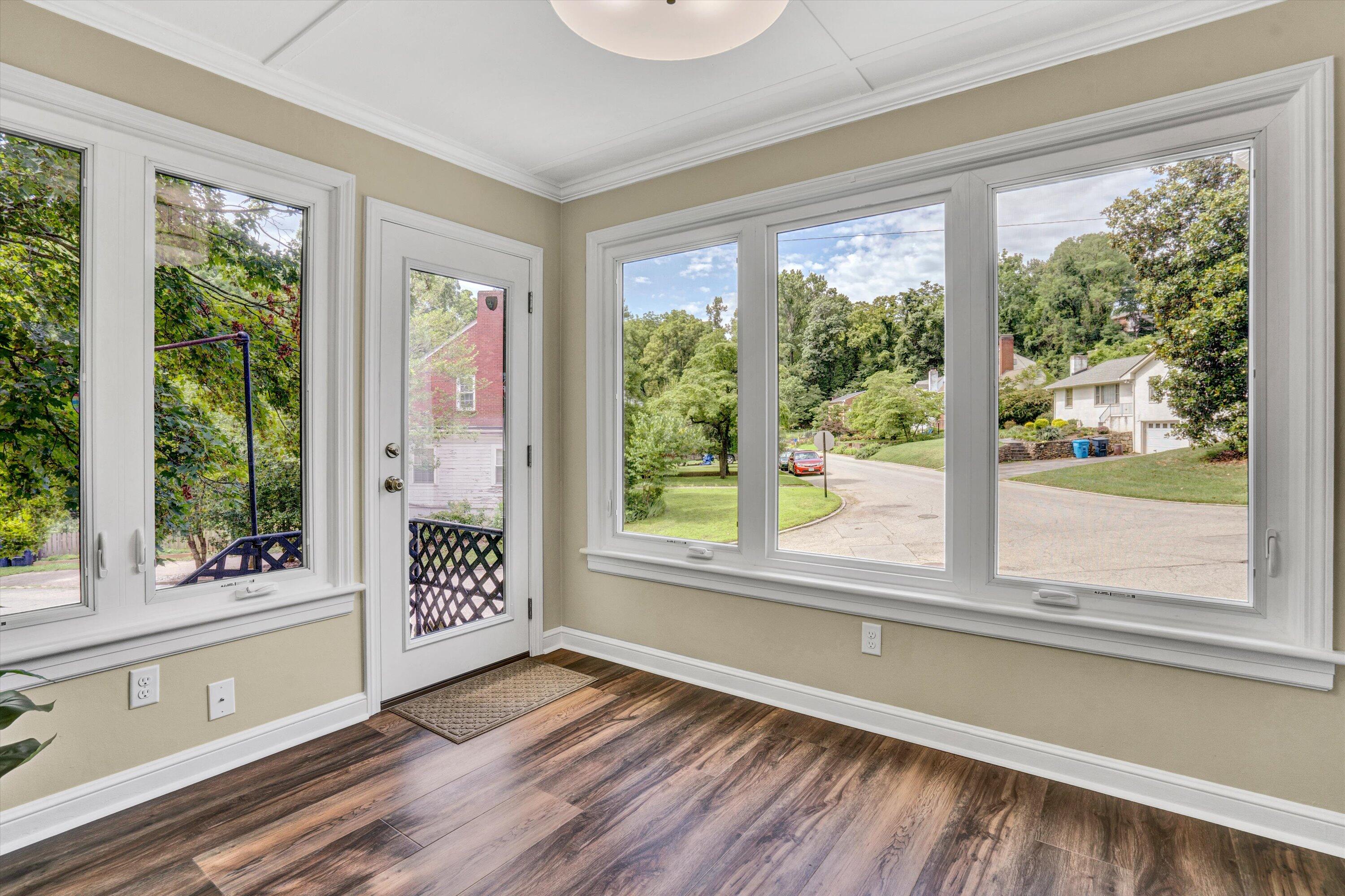 2118 Mt Vernon Road Southwest Roanoke, VA 24015 - Photo 13 of 53 a view of an empty room with wooden floor and a window