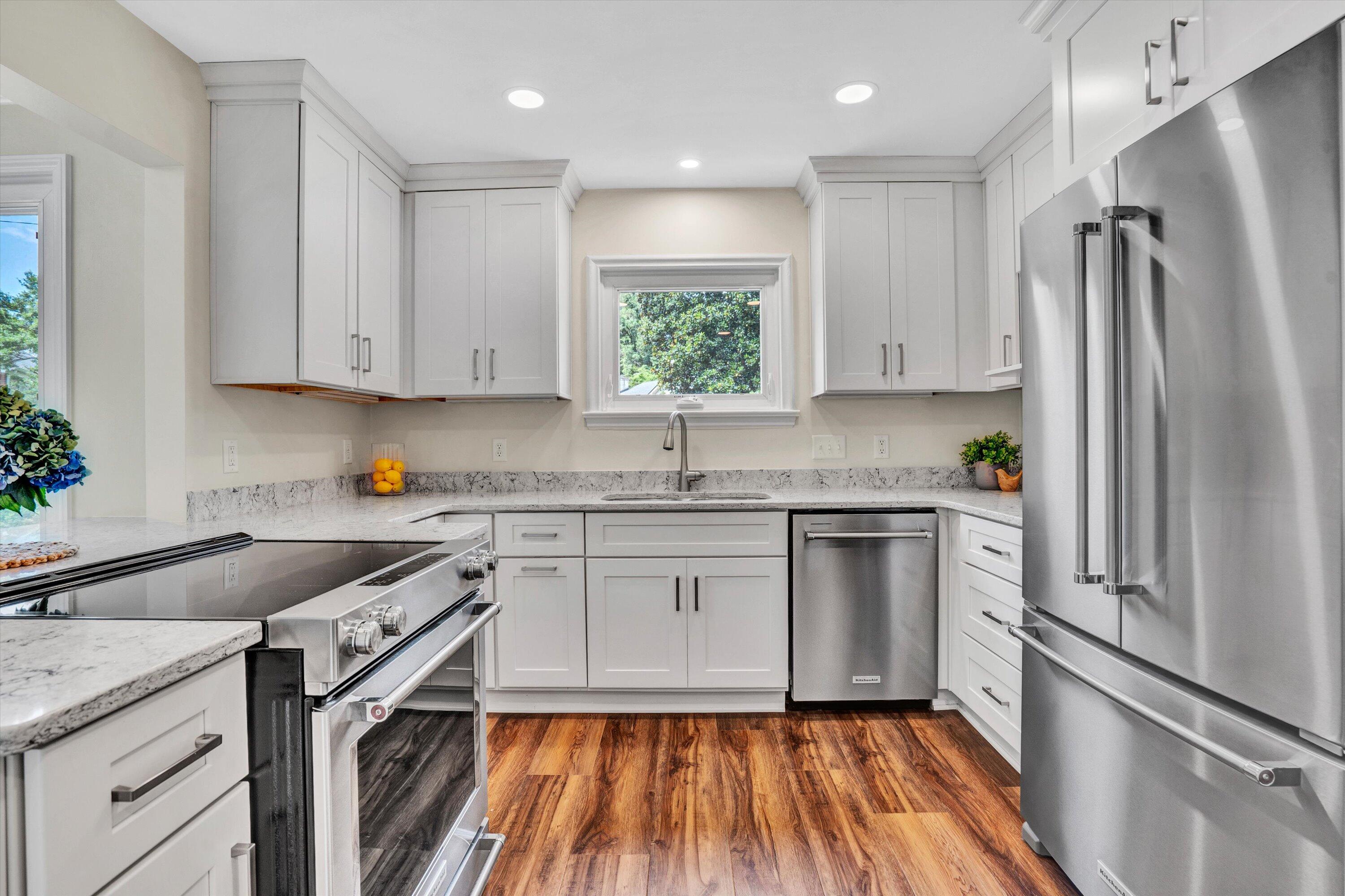 2118 Mt Vernon Road Southwest Roanoke, VA 24015 - Photo 20 of 53 a kitchen with a refrigerator sink and cabinets