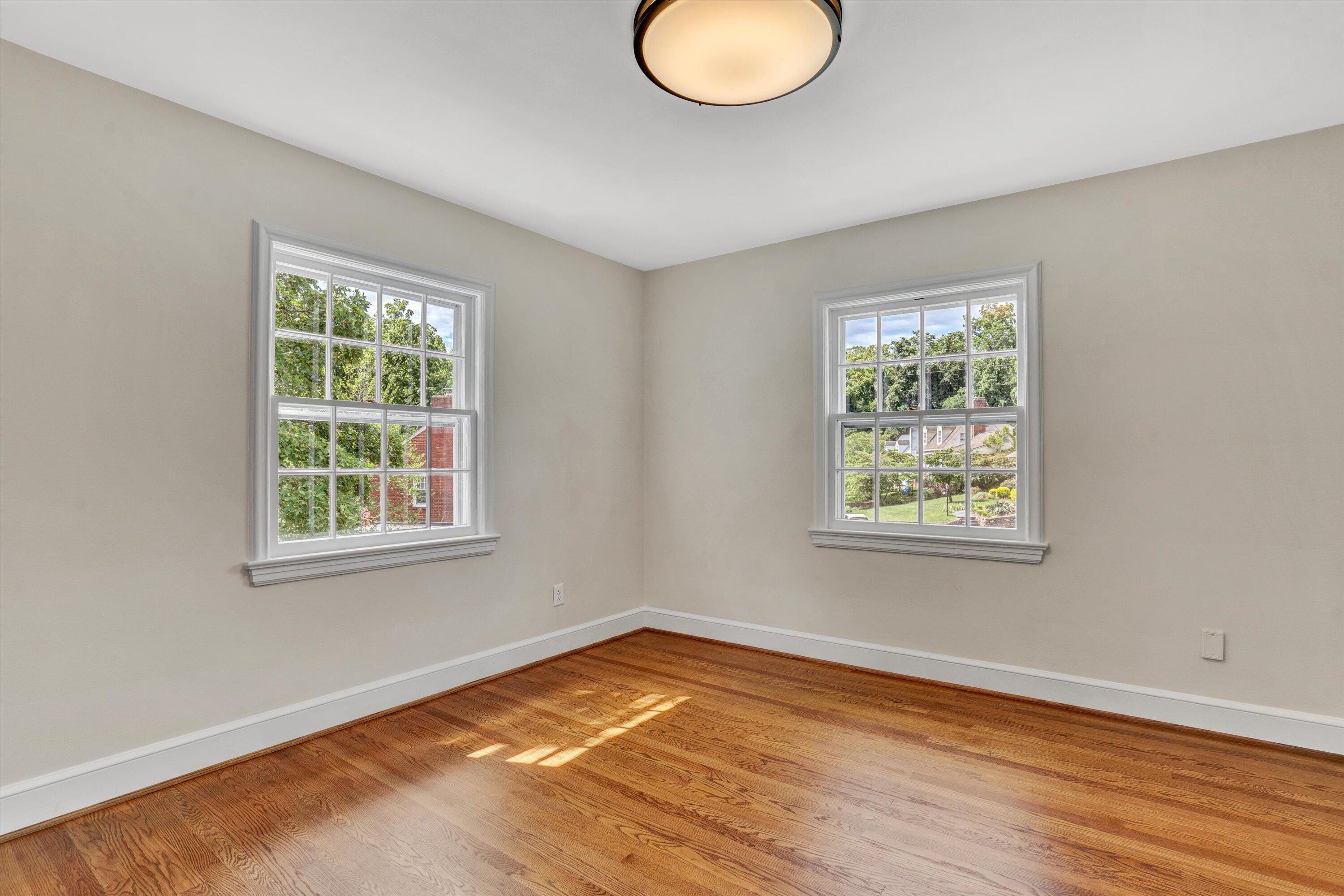 2118 Mt Vernon Road Southwest Roanoke, VA 24015 - Photo 29 of 53 a view of a room with wooden floor and windows