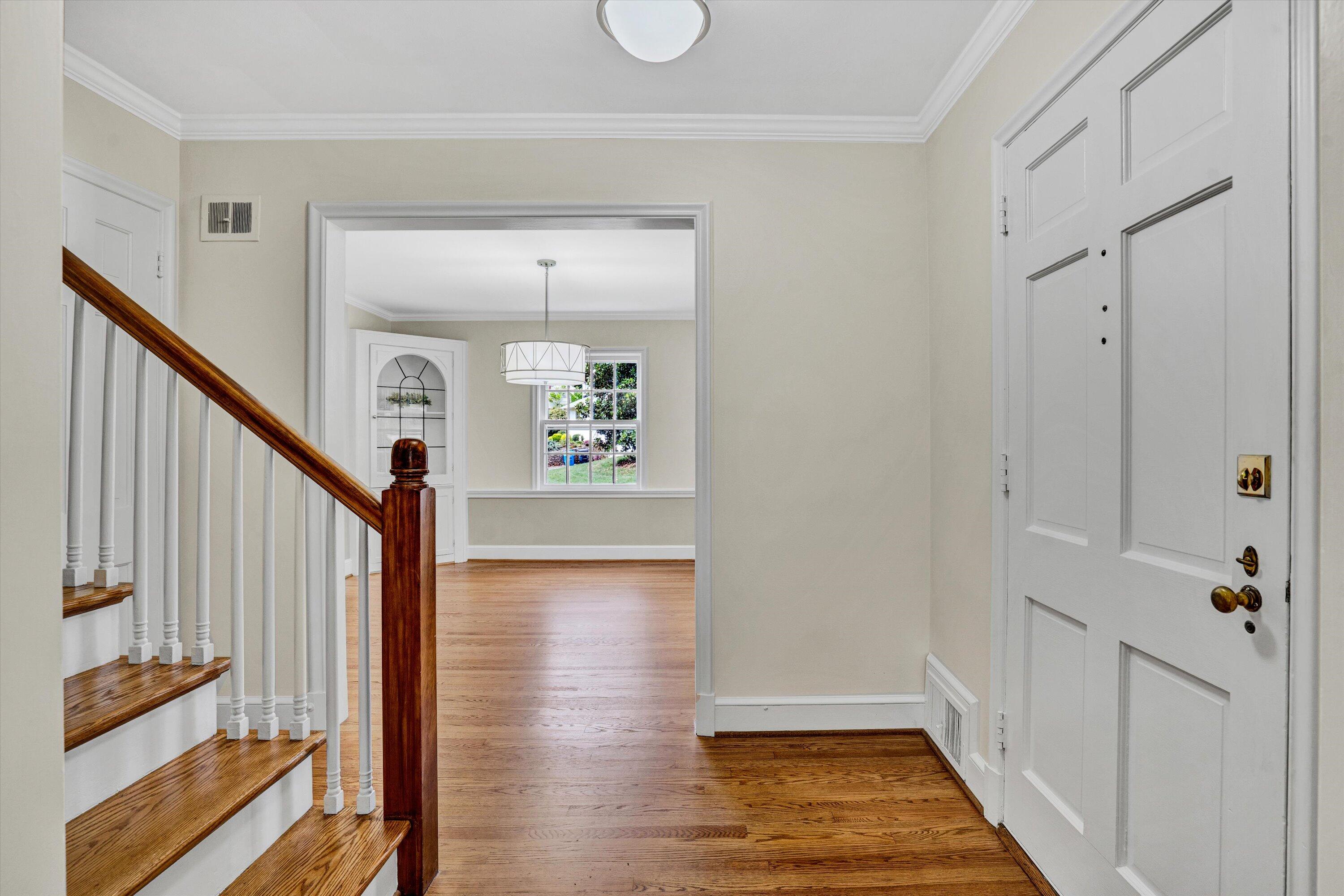2118 Mt Vernon Road Southwest Roanoke, VA 24015 - Photo 3 of 53 a view of a hallway with wooden floor and staircase