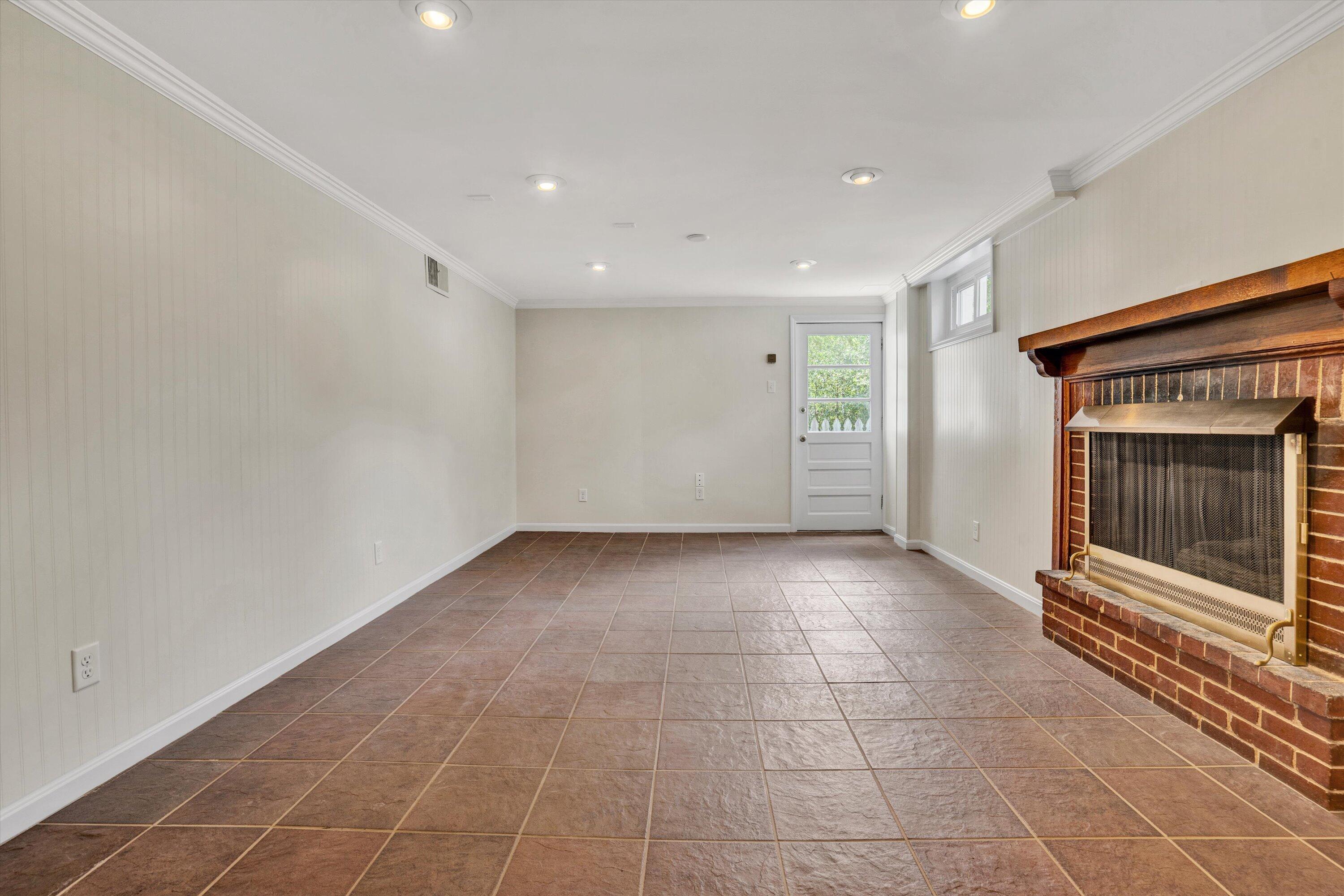 2118 Mt Vernon Road Southwest Roanoke, VA 24015 - Photo 42 of 53 a view of an empty room with a fireplace