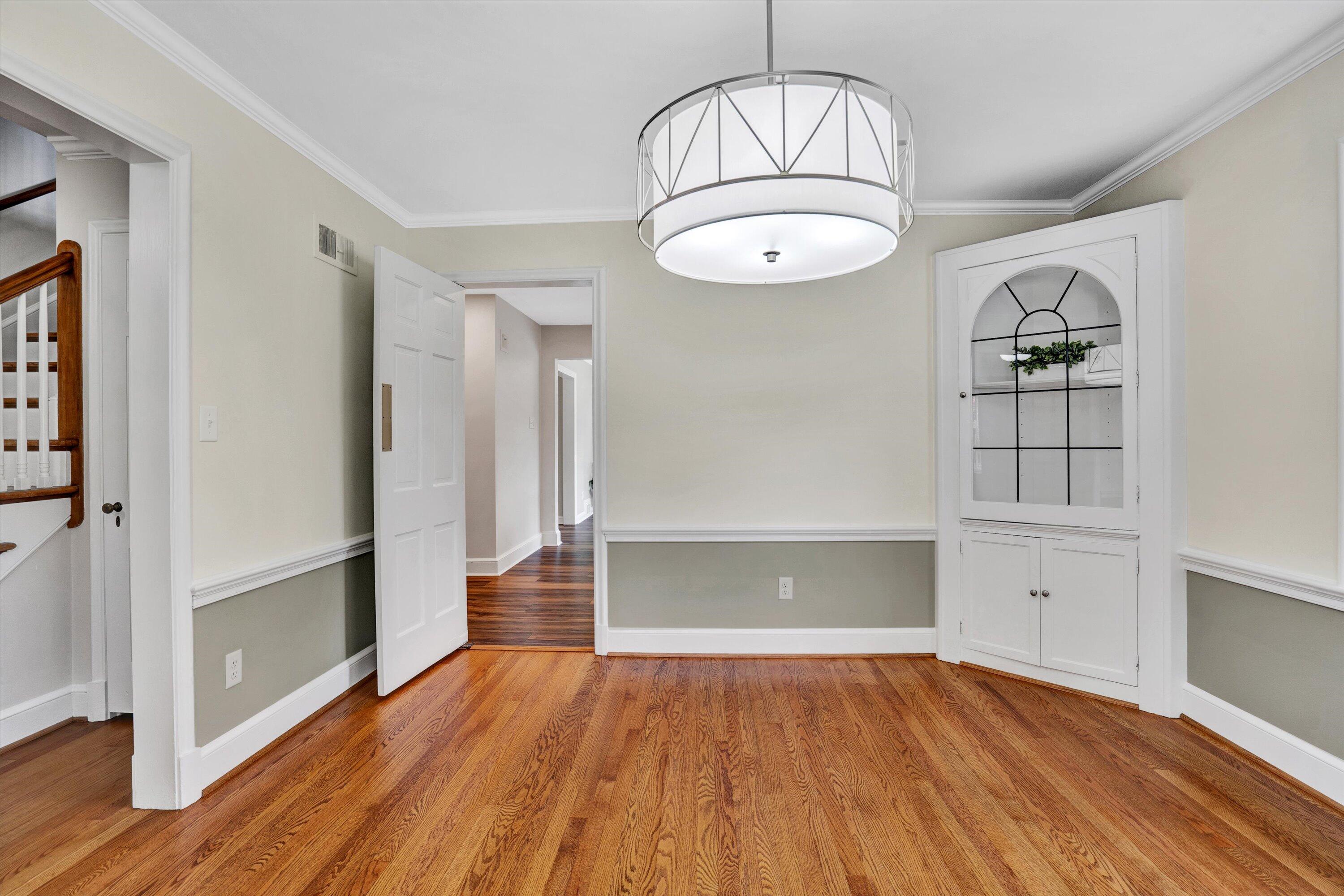 2118 Mt Vernon Road Southwest Roanoke, VA 24015 - Photo 7 of 53 a view of empty room with wooden floor and window