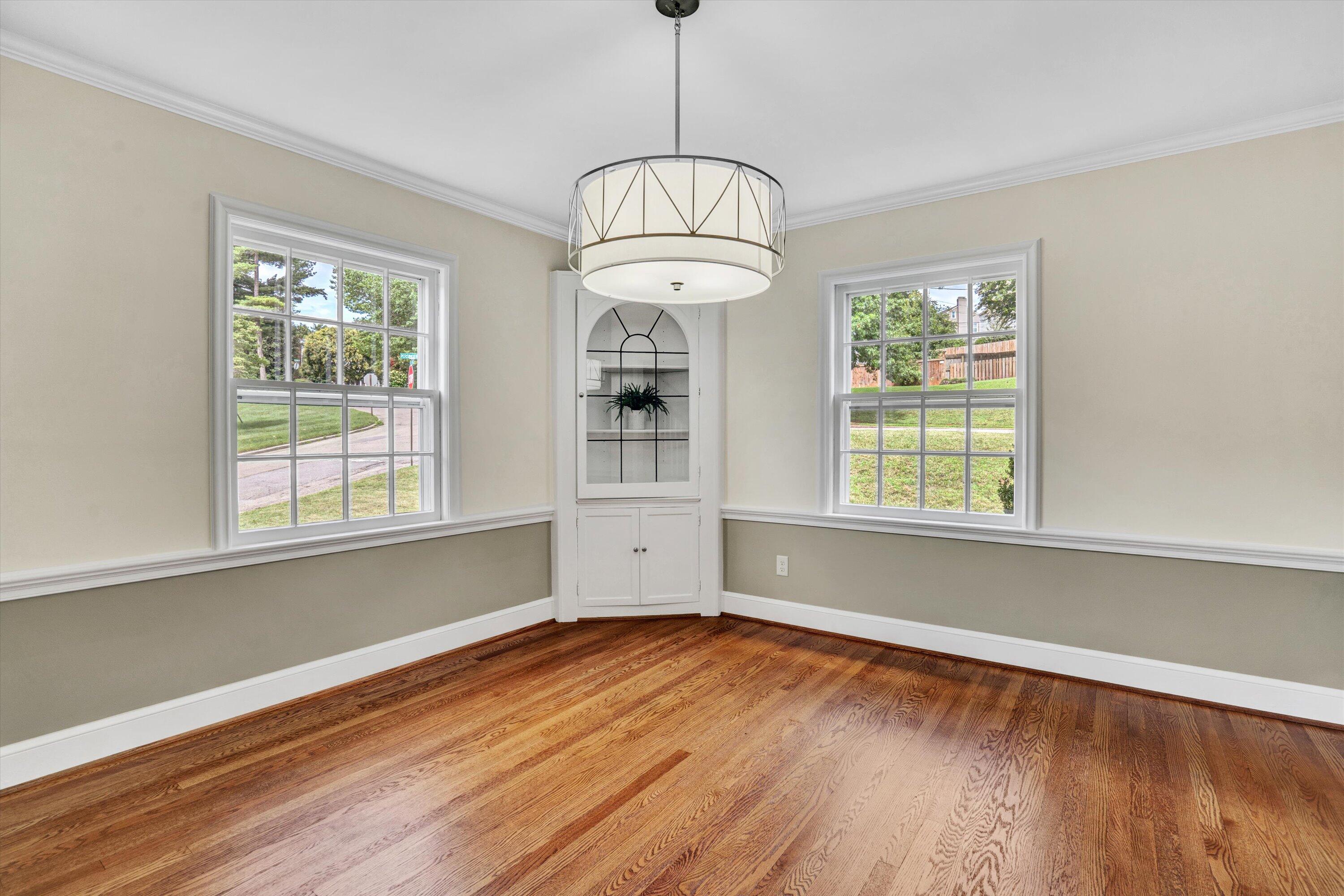 2118 Mt Vernon Road Southwest Roanoke, VA 24015 - Photo 8 of 53 wooden floor in an empty room with a window