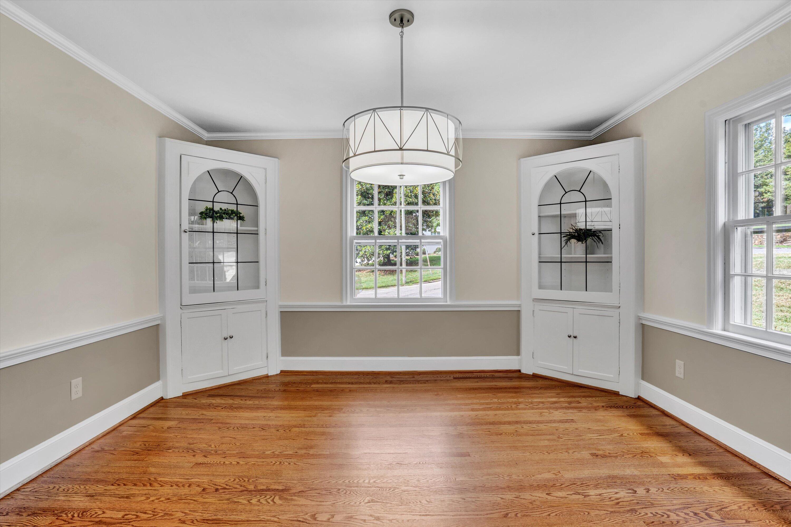 2118 Mt Vernon Road Southwest Roanoke, VA 24015 - Photo 9 of 53 wooden floor in an empty room with a window