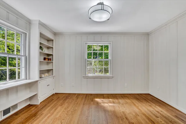 an empty room with windows