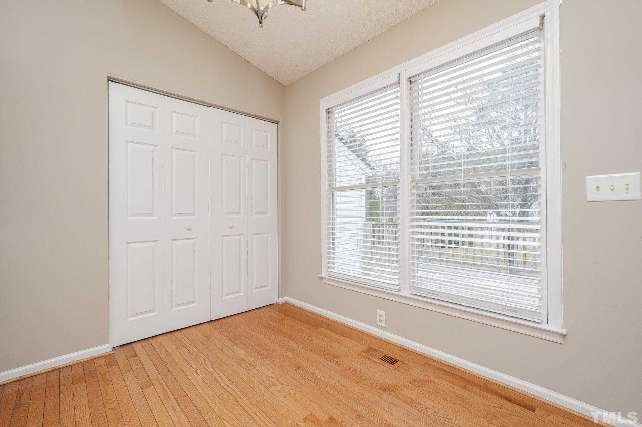 105 Pineview Drive Zebulon, NC 27597 - Photo 11 of 29 a view of an empty room with a window
