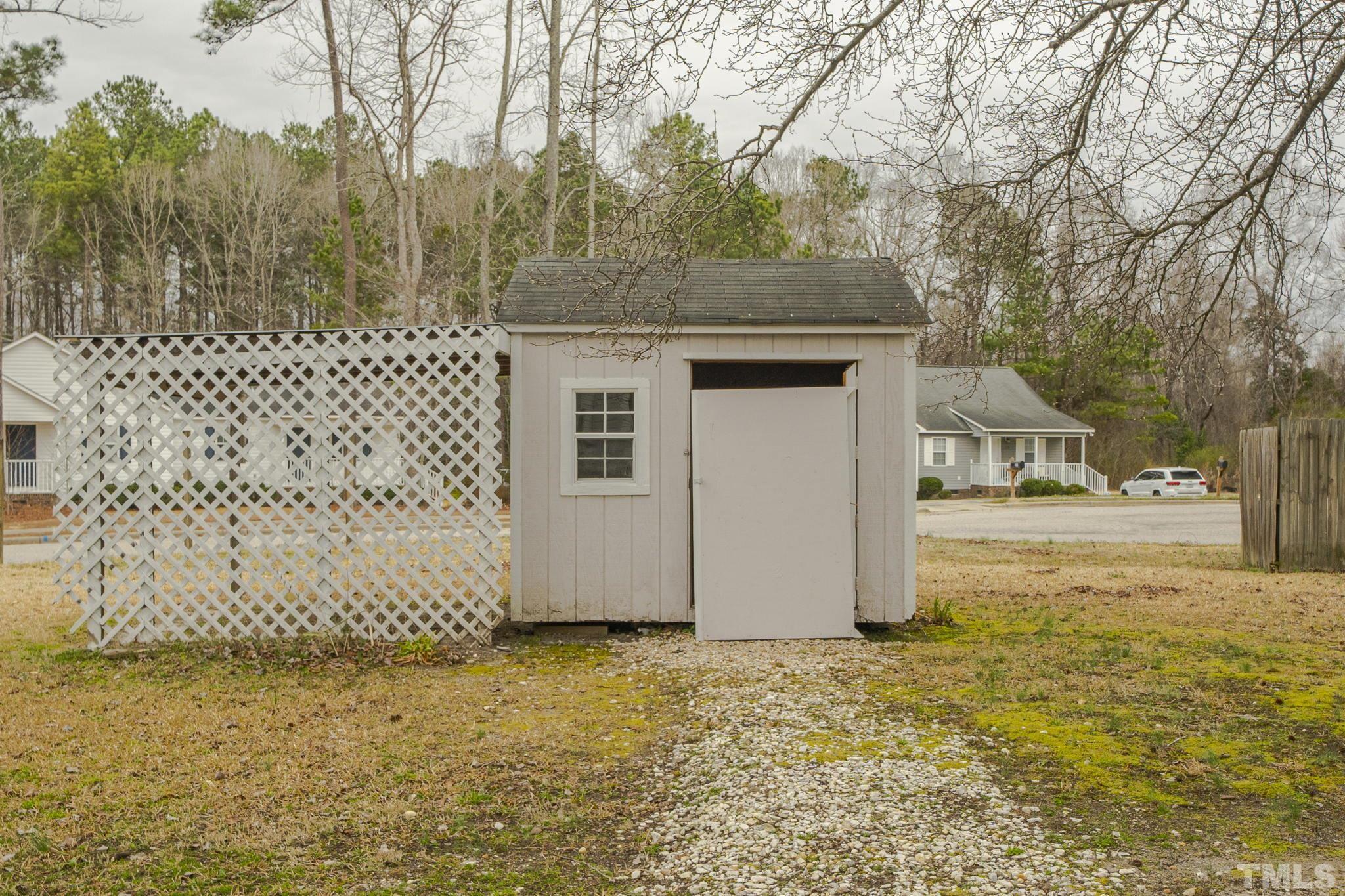 105 Pineview Drive Zebulon, NC 27597 - Photo 25 of 29 a house view with a yard