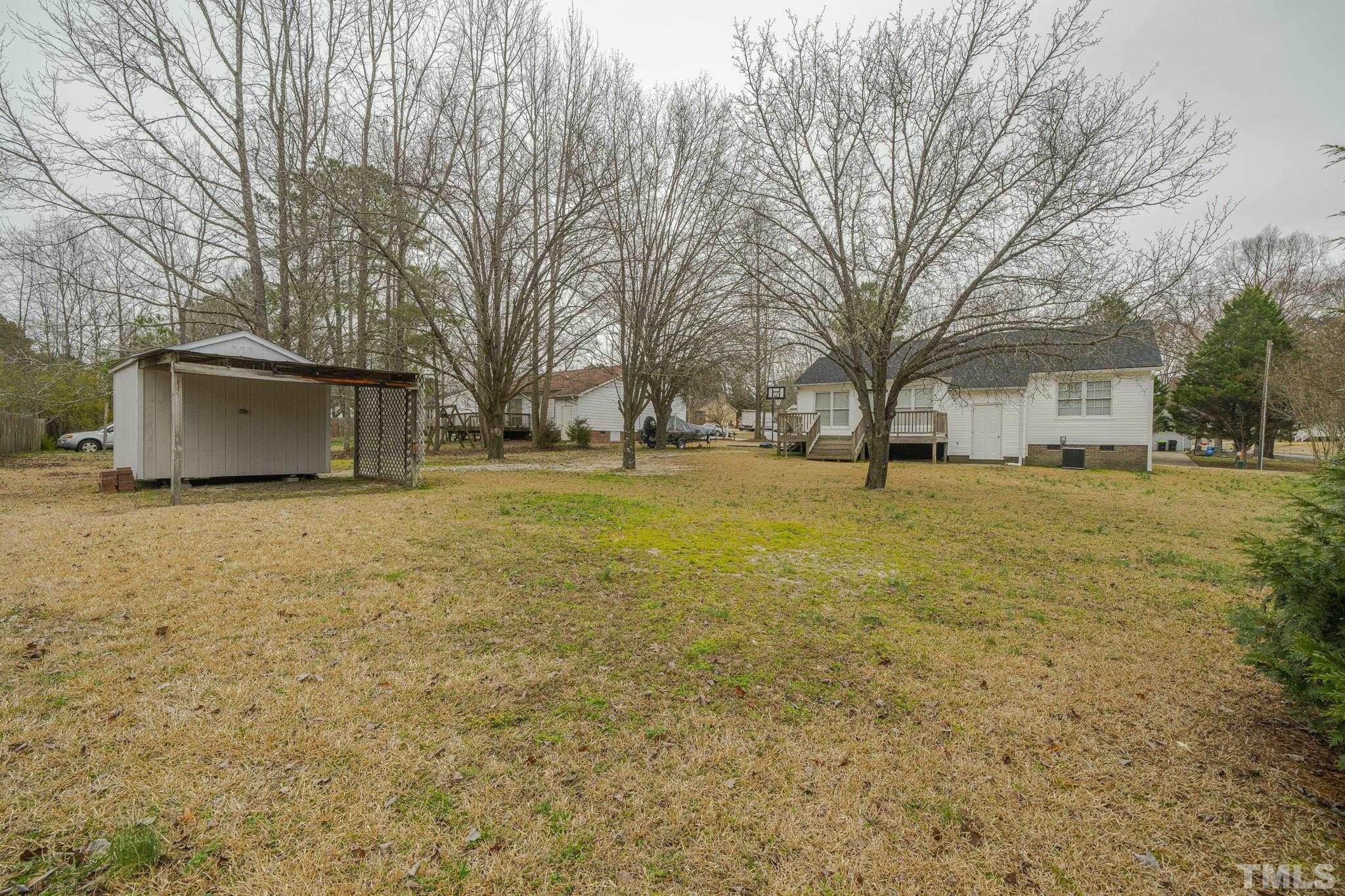 105 Pineview Drive Zebulon, NC 27597 - Photo 29 of 29 a view of swimming pool with an outdoor space