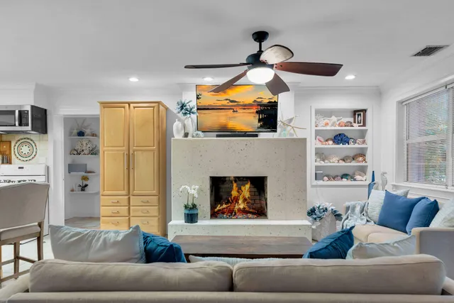 a kitchen with a sink cabinets and window