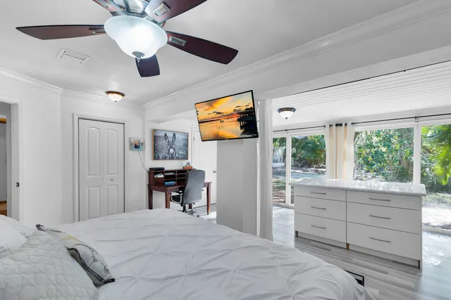 a bathroom with a sink a mirror and a washing machine