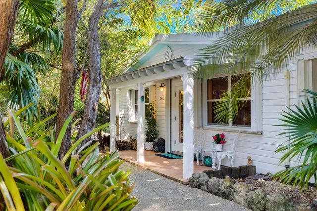 a front view of a house with a porch