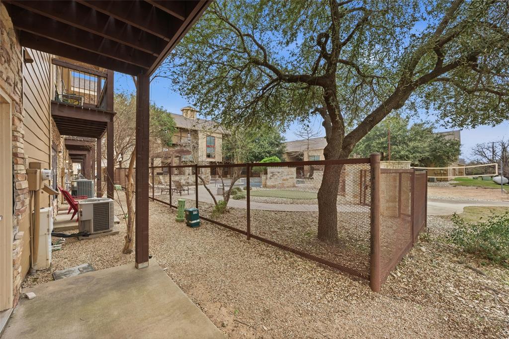 2410 South 2nd Street, Unit 737 Waco, TX 76706 - Photo 29 of 40 covered back porch and view of the community pool