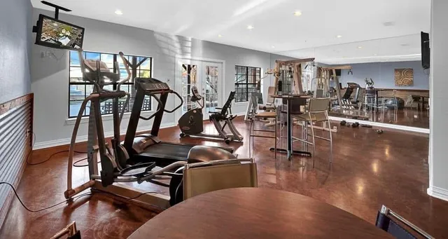 a view of a room with gym equipment