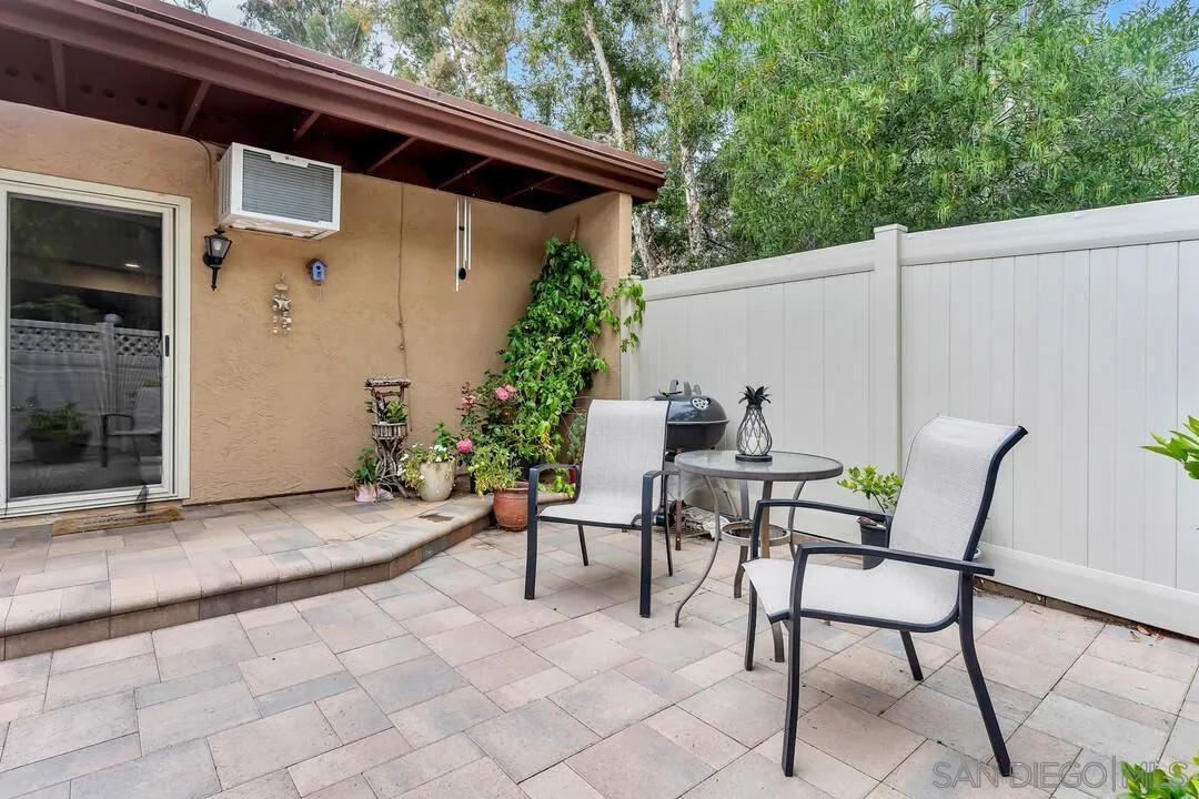 8683 Wahl Street Santee, CA 92071 - Photo 20 of 24 a view of patio with a table and chairs and potted plants