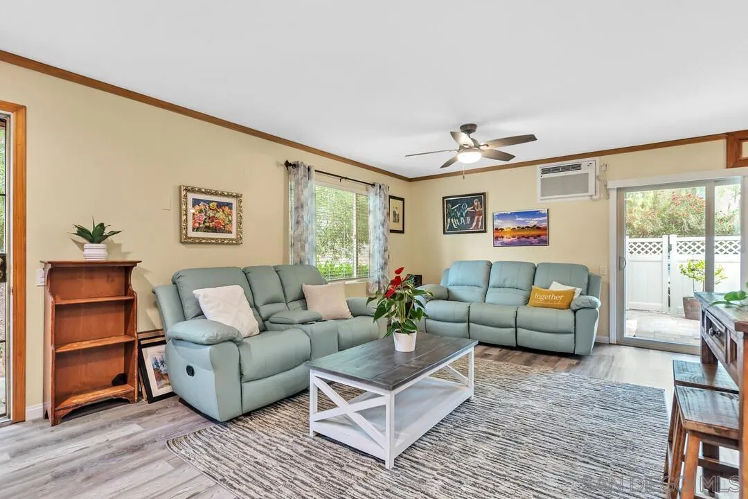8683 Wahl Street Santee, CA 92071 - Photo 6 of 24 a living room with furniture and a window