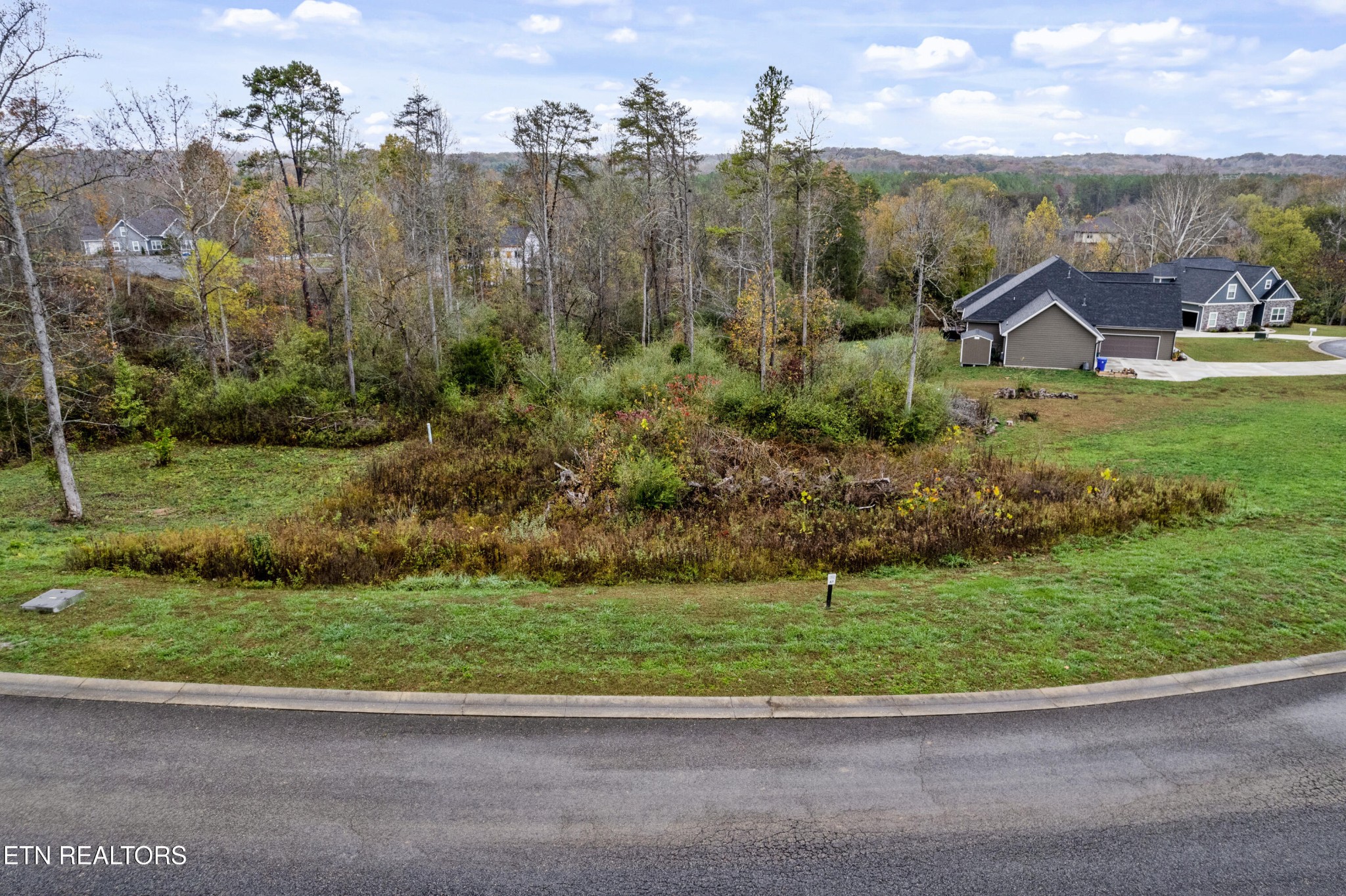 162 Frst Crk Parkway Oak Ridge, TN 37830 - Photo 8 of 13 a view of a house with a yard