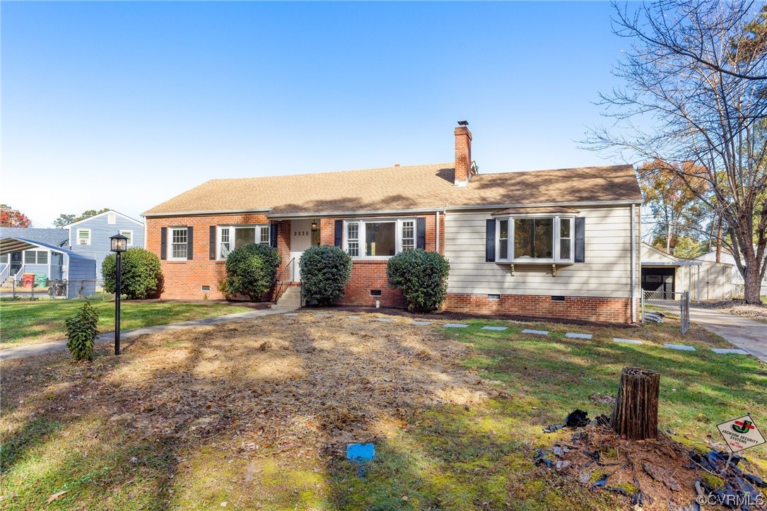 2535 Fort Lee Road Petersburg, VA 23805 - Photo 1 of 26 a front view of a house with a yard