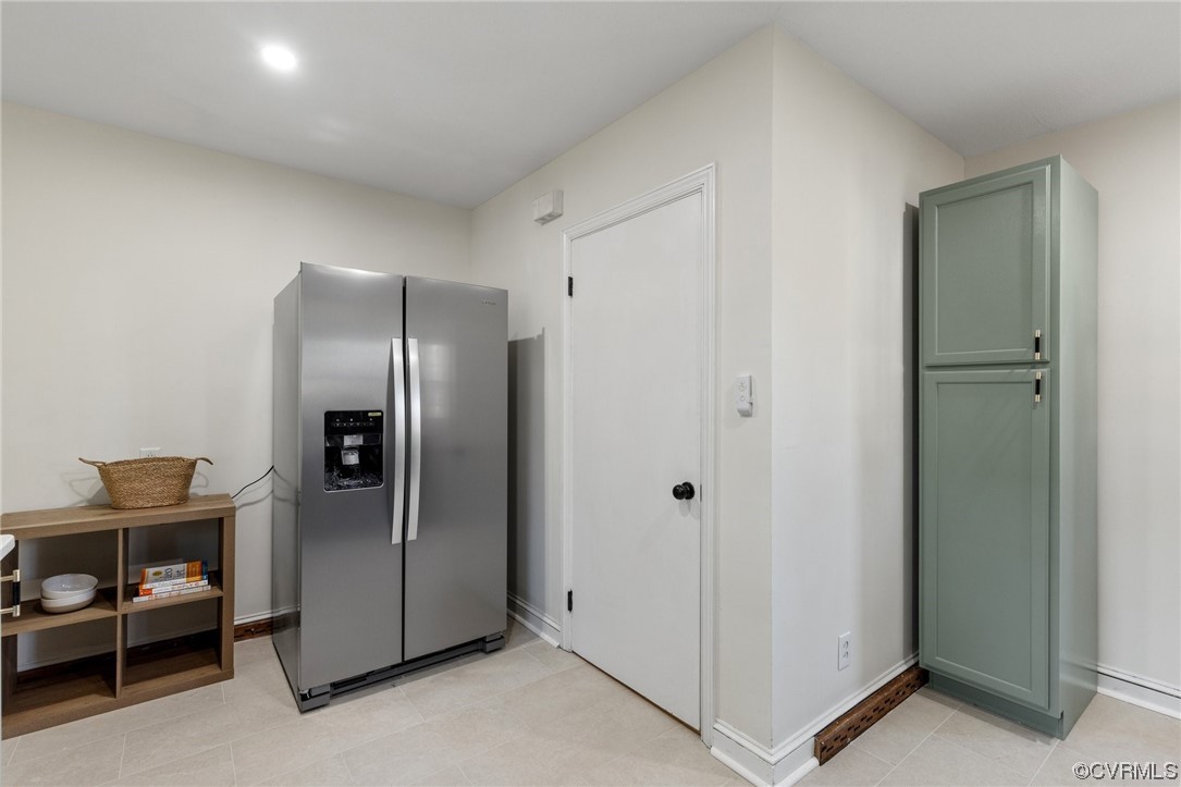 2535 Fort Lee Road Petersburg, VA 23805 - Photo 16 of 26 a view of a room with a refrigerator and chair
