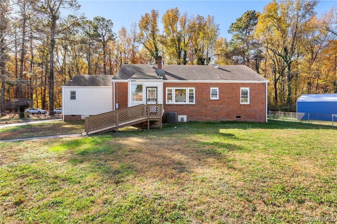 2535 Fort Lee Road Petersburg, VA 23805 - Photo 26 of 26 a front view of a house with a garden and yard